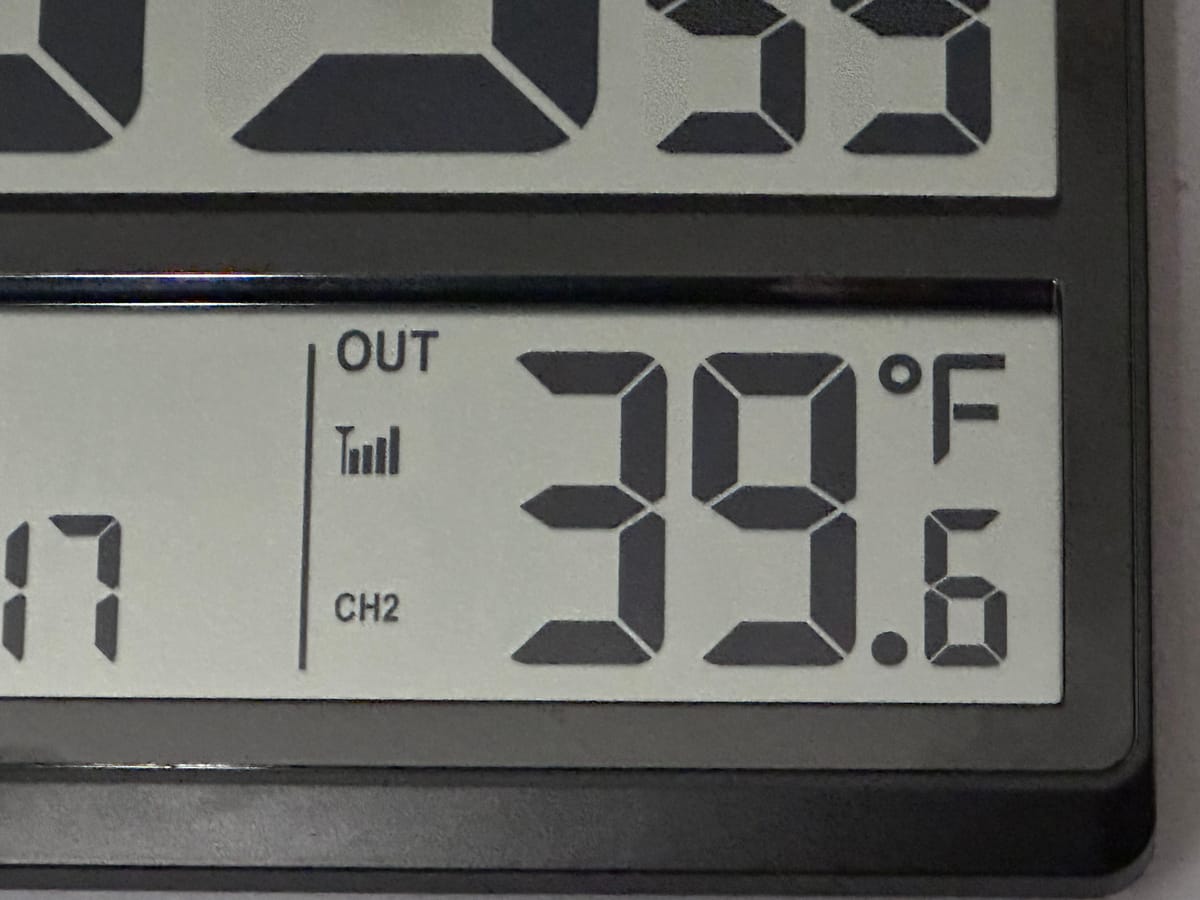 Cropped image of a digital display of the Outside temp: 39.6°F